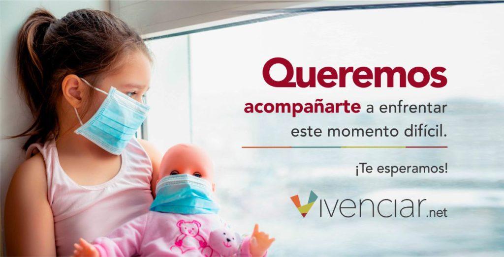 Banner de Vivenciar.net que muestra a niña sosteniendo una muñeca en brazos, ambas usando mascarillas para protegerse del coronavirus, y el siguiente mensaje: "Queremos acompañarte a enfrentar este momento difícil. ¡Te esperamos!"